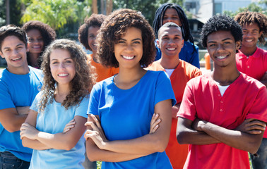 Large group of happy african woman and caucasian and latin american and hispanic man