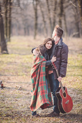 young couple in autumn park