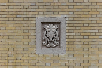 Fancy relief on brick wall