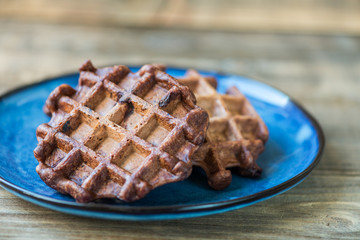 Chocolate Belgium Waffles on Dark Rustic Background