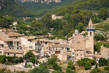Fototapeta na wymiar Mediterranean village in the Tramuntana mountains, view of Valldemossa, beautiful landscape of Majorca island Spain