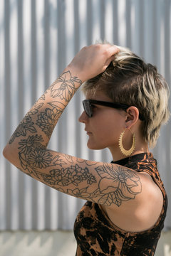 Woman with tattoo on her shoulder