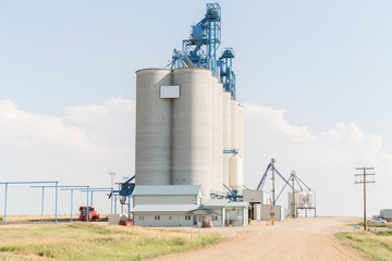 tall cement grain elevator © snaphappy28
