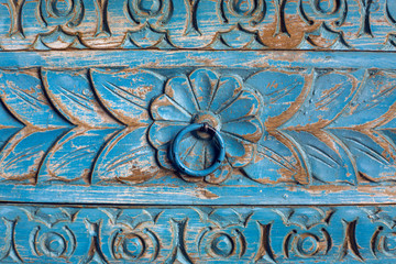 item wooden wardrobe painted in blue paint pattern and carving with flower and leaves
