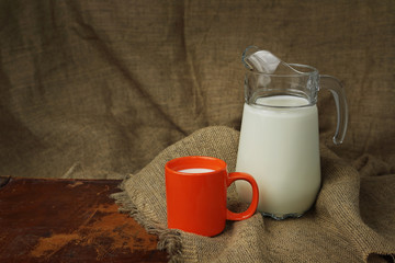 Jug with a milk mug