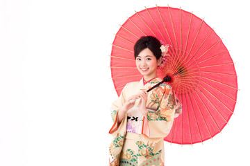 portrait of young asian woman wearing traditional kimono isolated on white background