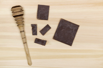 Traditional mexican molinillo and chocolate