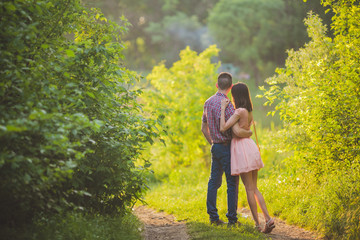 young couple in love together on nature