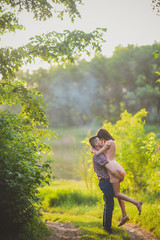 Happy couple on vacation. Lovers are laughing. Happy guy and girl.