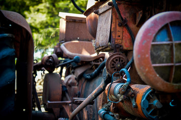 Fototapeta na wymiar an abandoned old tractor