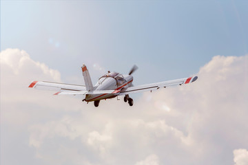 Fototapeta na wymiar sport motor airplane in the air