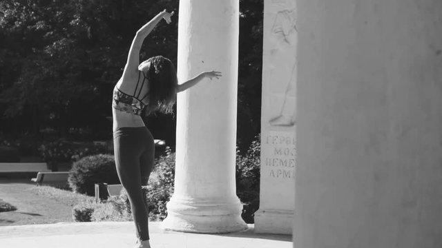 Young couple dancing on the square