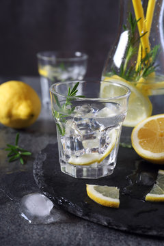 Detox water, fresh  lemonade with ice, lemon and rosemary