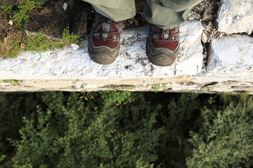successful  hiker legs on the top of great wall