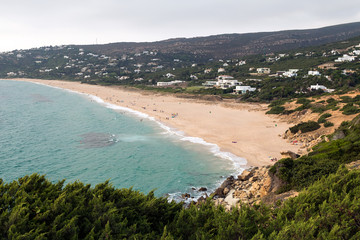 German Beach with golden sand, in Tarifa, Spain. Views from the Camarinal lighthouse