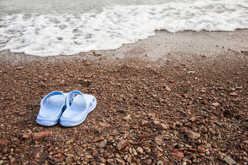Slippers on the beach