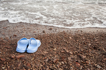 Slippers on the beach