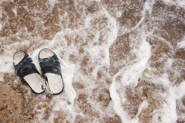 Slippers on the beach