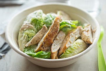 Chicken Caesar Salad with grilled chicken, parmesan and sauce 