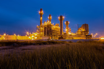 Fototapeta na wymiar Gas turbine electric power plant at night 