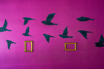 Bird painting on purple wall