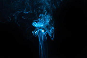 Fototapeta premium blue smoke on black background