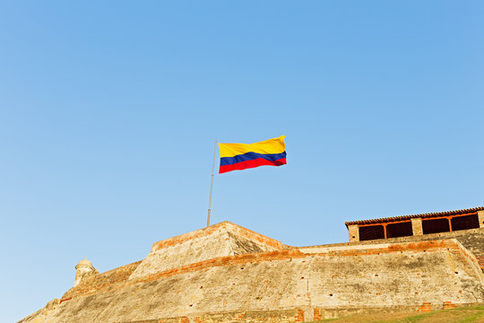San Felipe de Barajas fortress with national flag in Cartagena, Colombia. The Hill of San Lazaro with famous military fortress.