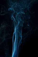 Fototapeta premium blue smoke on black background