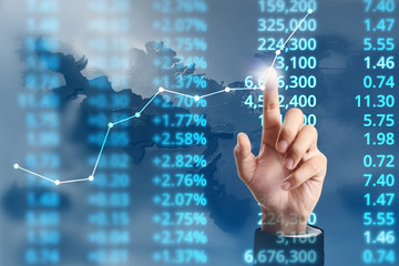 Obraz premium Businessman plan growth and increase of chart positive indicators in his business