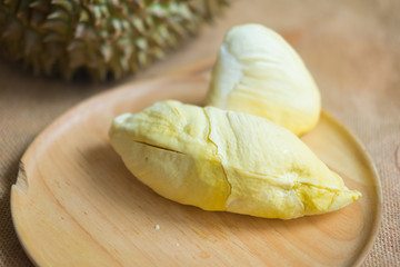 Durian on wooden plate