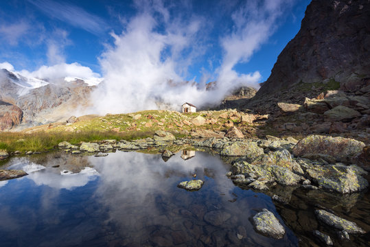 Pond at Larcher refuge.Europe, Italy, Trentino region, Venezia valley, Sun valley, Pejo, national park Stelvio