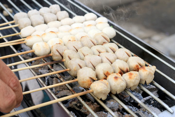 Grilled meatballs on the stove. Thai Street Food .