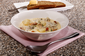 fine dinning, fish chowder with thyme and crushed peppercorn