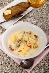 fine dinning, fish chowder with thyme and crushed peppercorn