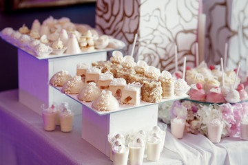 White boxes with plates for white sweets