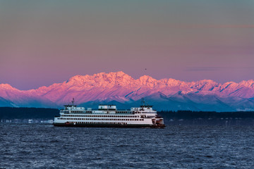 Ferry crossing Puget Sound. Snow capped Olympic Mtns. - obrazy, fototapety, plakaty