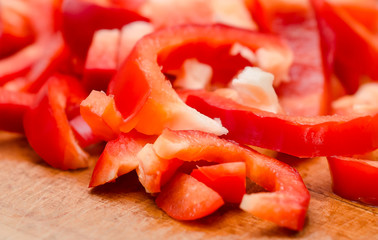 Pieces of red pepper on the table