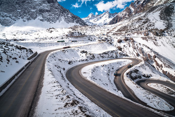 Mountain Winter Road Landscape. Snow Sunset Background Landscape. Mountains Rocks, Peak, Cliff....