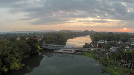Fototapeta premium aerial landscape of beautiful sunset with bridge