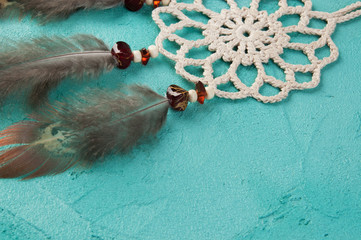 Dream catcher on aquamarine