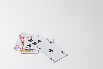 Card game. A woman makes a move - hits a smaller card of the larger. On a white background.