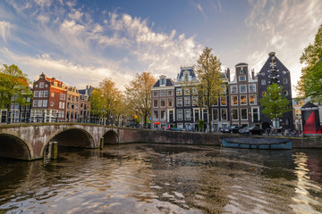 Fototapeta premium Amsterdam city skyline at canal waterfront, Amsterdam, Netherlands