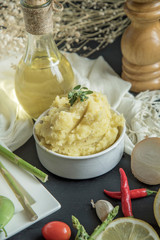Mashed potatoes in blue bowl.