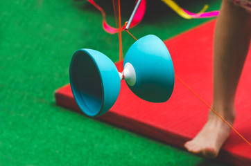 Child playing with Diabolo toy