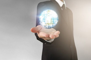 Businessman hand touching network connection. Elements of this image furnished by NASA