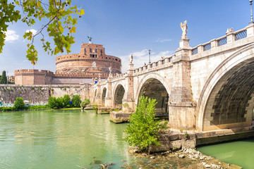 Obraz premium The Mausoleum of Hadrian, usually known as Castel Sant'Angelo (Castle of the Holy Angel) and Sant' Angelo Bridge. Rome. Italy.