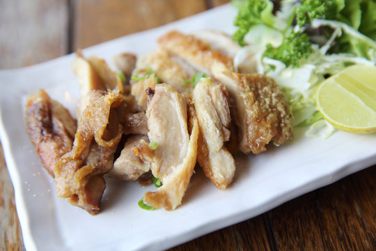 Chicken teriyaki , Chicken grilled with salt on wood background , Japanese food