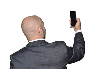 Naklejka premium Selfie del ejecutivo con el telefono smatphone.
