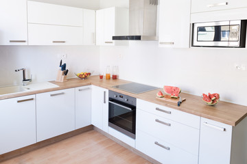 Fototapeta premium New modern white kitchen interior background