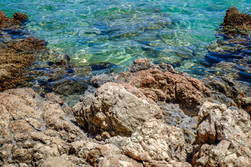 Sea coast with rocks on sunny day